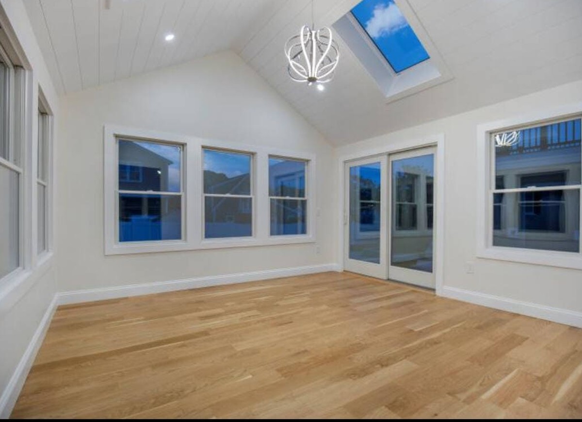 Finished four season sunroom addition by Coast Carpentry in West Hyannis Port